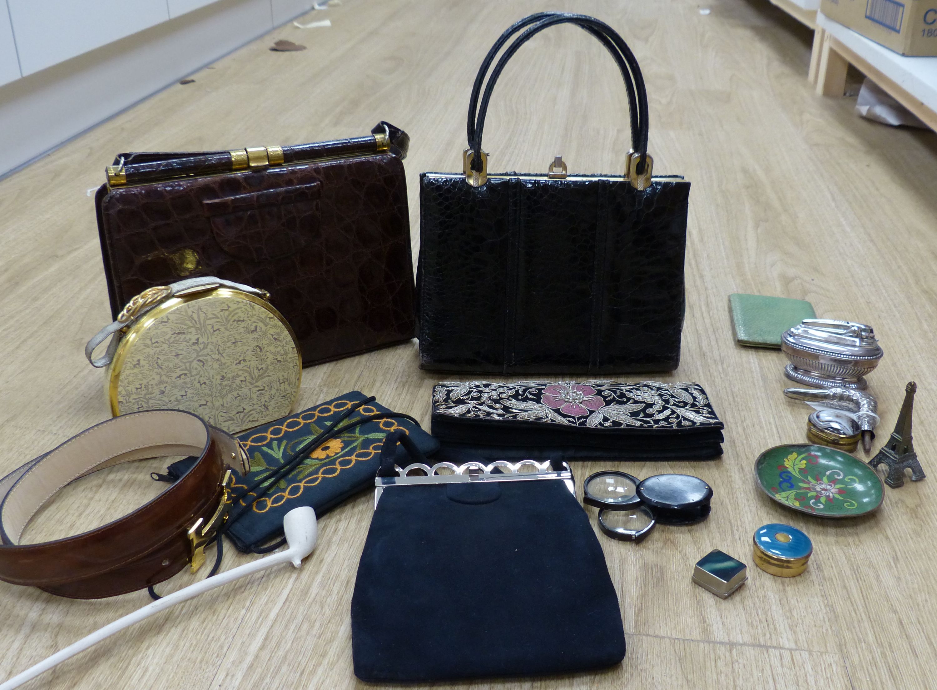 A silver duck umbrella handle, a shagreen cigarette case, horn spy glass boxes and five bags, etc.